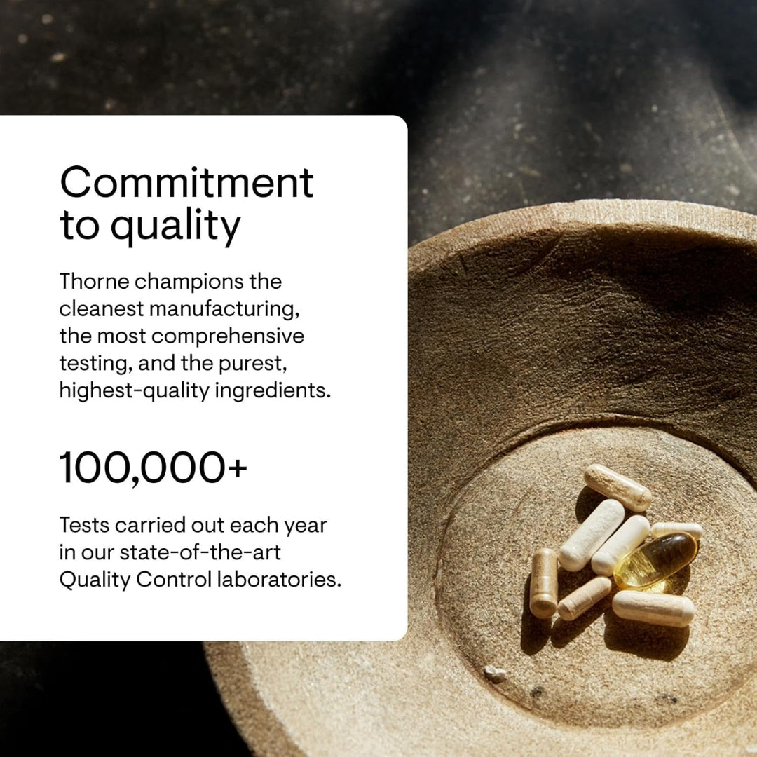 Pills on a wooden surface with text about Thorne's commitment to quality and testing.