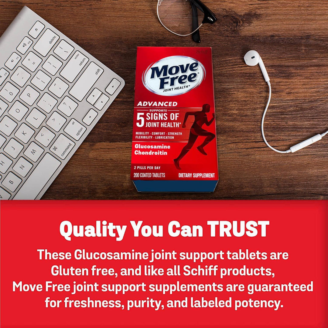 Move Free supplement package on a desk with keyboard, glasses, and earbuds.